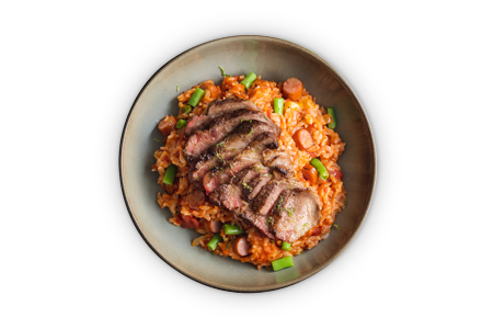 Fried Iberico pork chop over tomato risotto